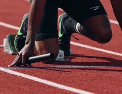 Runner preparing to run on a race track