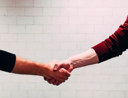Two people shaking hands