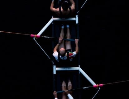 Rowing team sat on a rowing boat