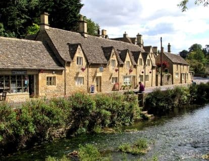 Village terrace houses along a shallow river