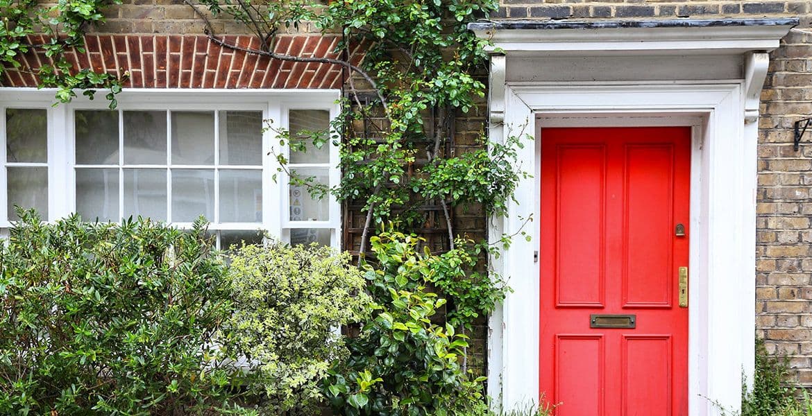 Period house with a red door