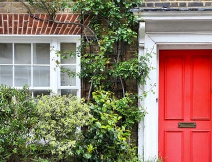 Front of house with red door