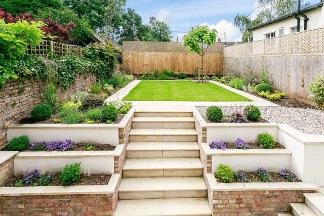 Steps leading to landscaped garden