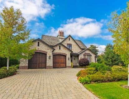 Luxury detached home with double garage, long driveway and front lawn